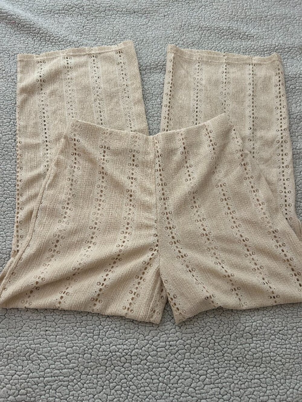 Cato -- cream flare pants with cut out lace design, lined shorts underneath